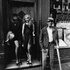 “Greenwich Village, when it was still Greenwich Village before the yuppies decimated it. Bleecker and Sullivan. I lived on Sullivan, and that was caddy-corner to me. Those were two girls out for the day, and then an old fellow who came from the Mills Hotel around the corner. It’s a wonderful moment.” 1978.